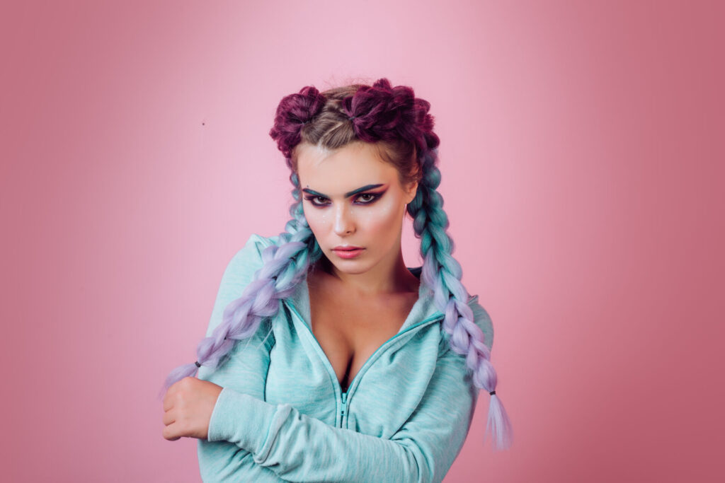 Girl with braided hair style. Hairdresser salon. Fancy look, Braided cutie. Little girl with cute braids close up. Kanekalon strand in braids of child. Braided hairstyle concept.